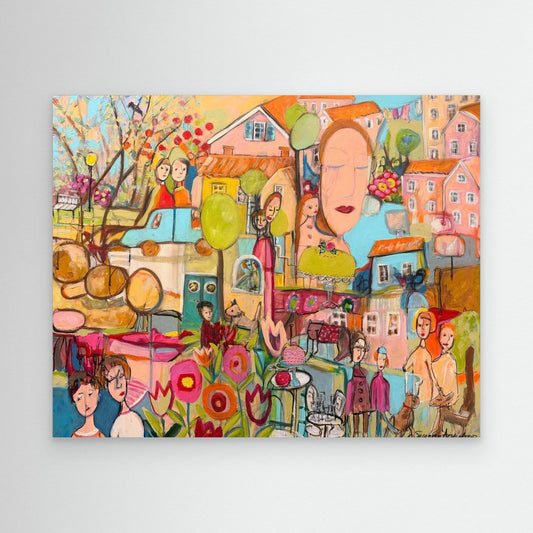 Färgstarkt konsttryck ”Kalas” av Susanne Arvidsson upphängd på ljus vägg